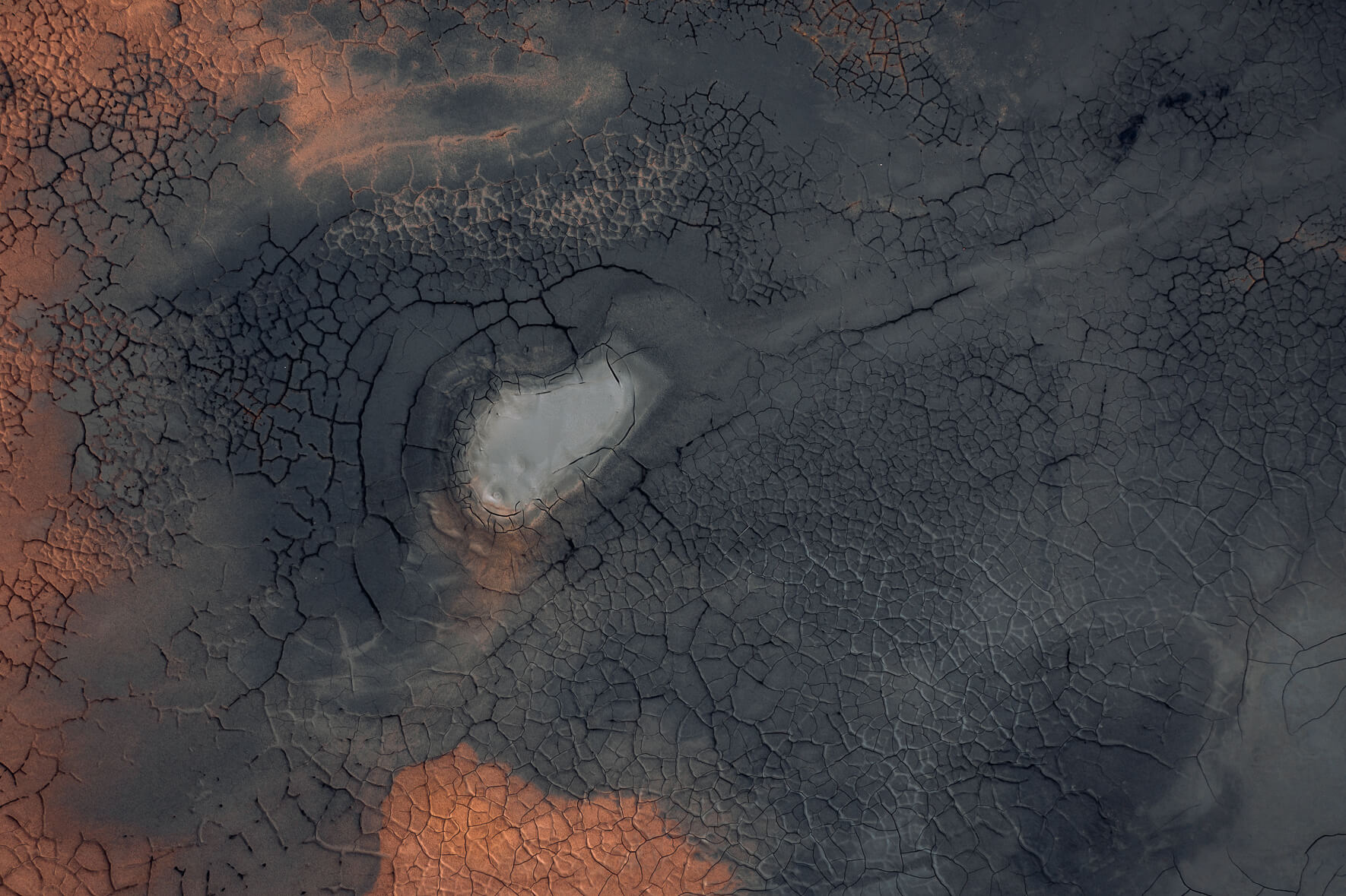 Textured landscapes: Aerial imagery of dried mud cracks in Námafjall, Iceland