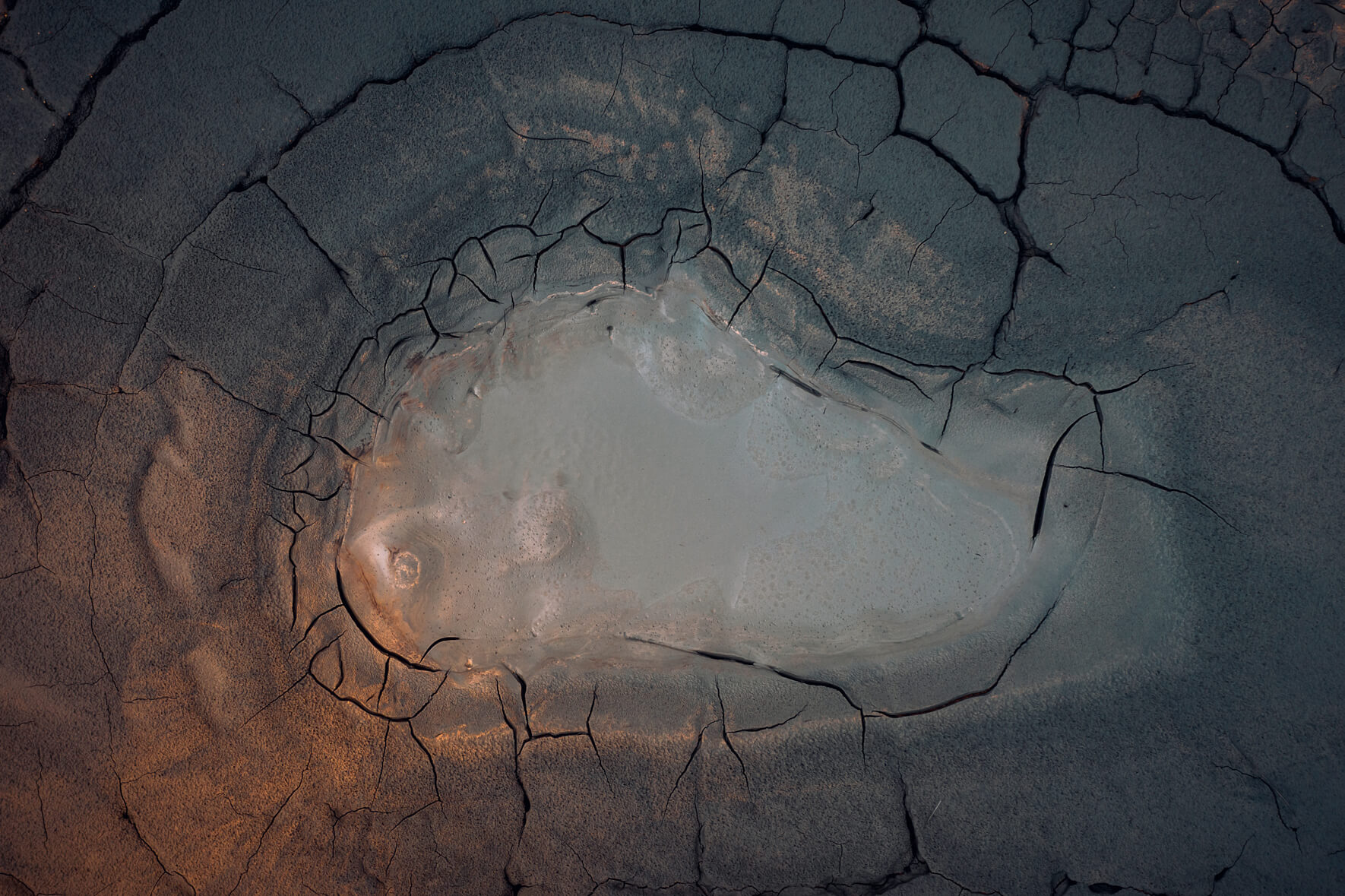 Mud pool in Námafjall geothermal area, Iceland