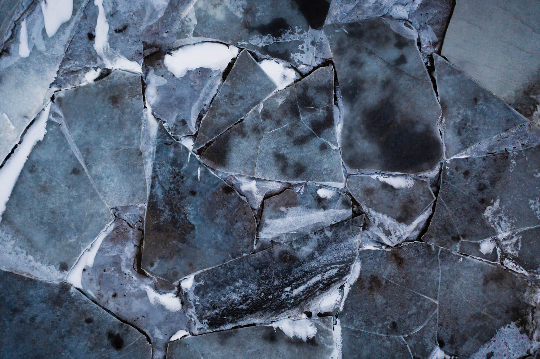 Abstract puzzle of ice floes on the frozen river Ölfusá in Iceland
