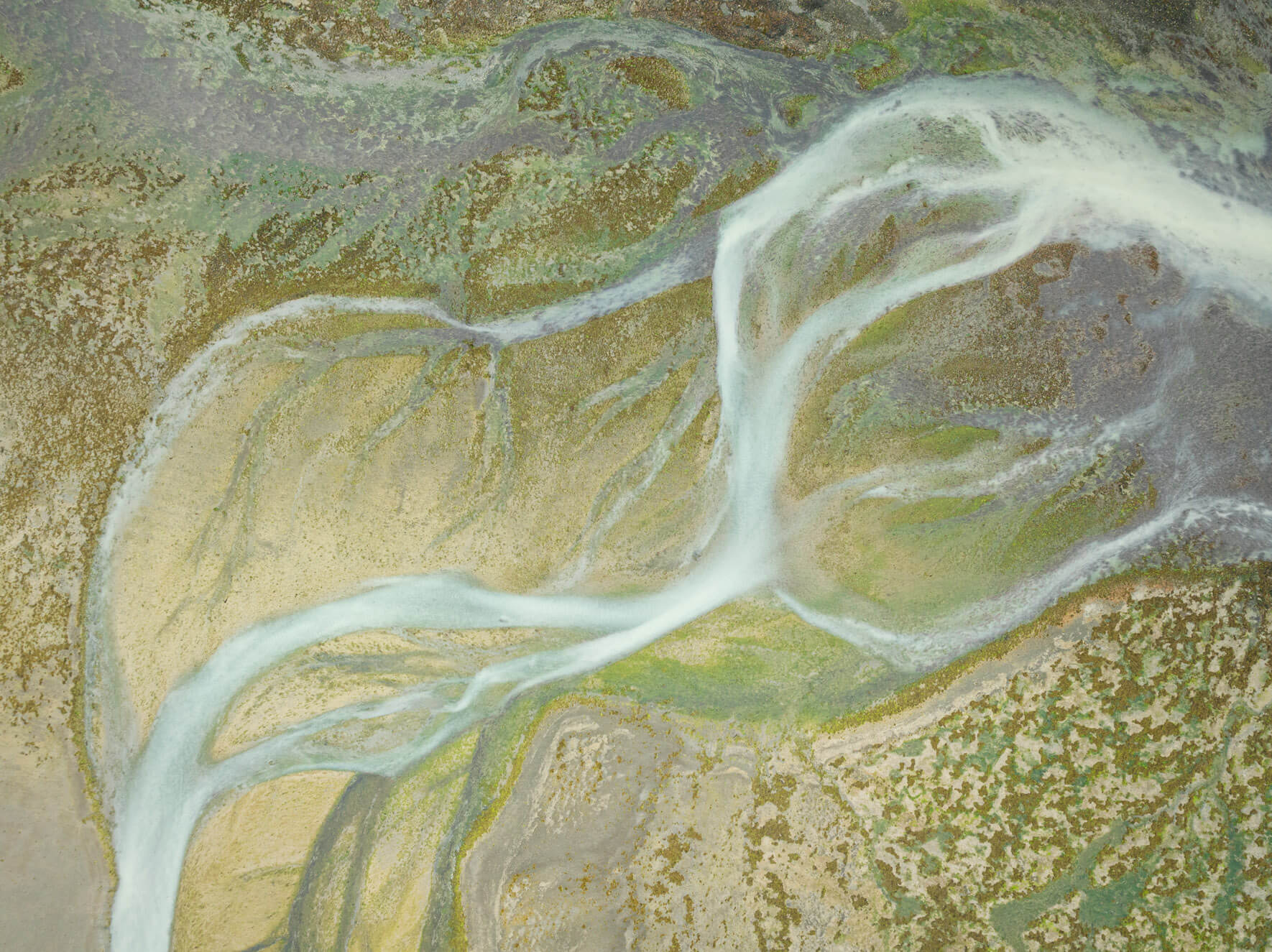 Alaska’s dynamic wetlands from above, where water, sediment, and vegetation intertwine