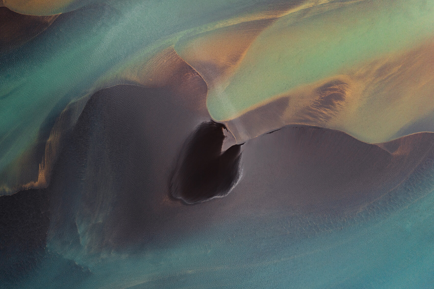 Aerial landscape photography of glacier rivers in Iceland by Jan Erik Waider