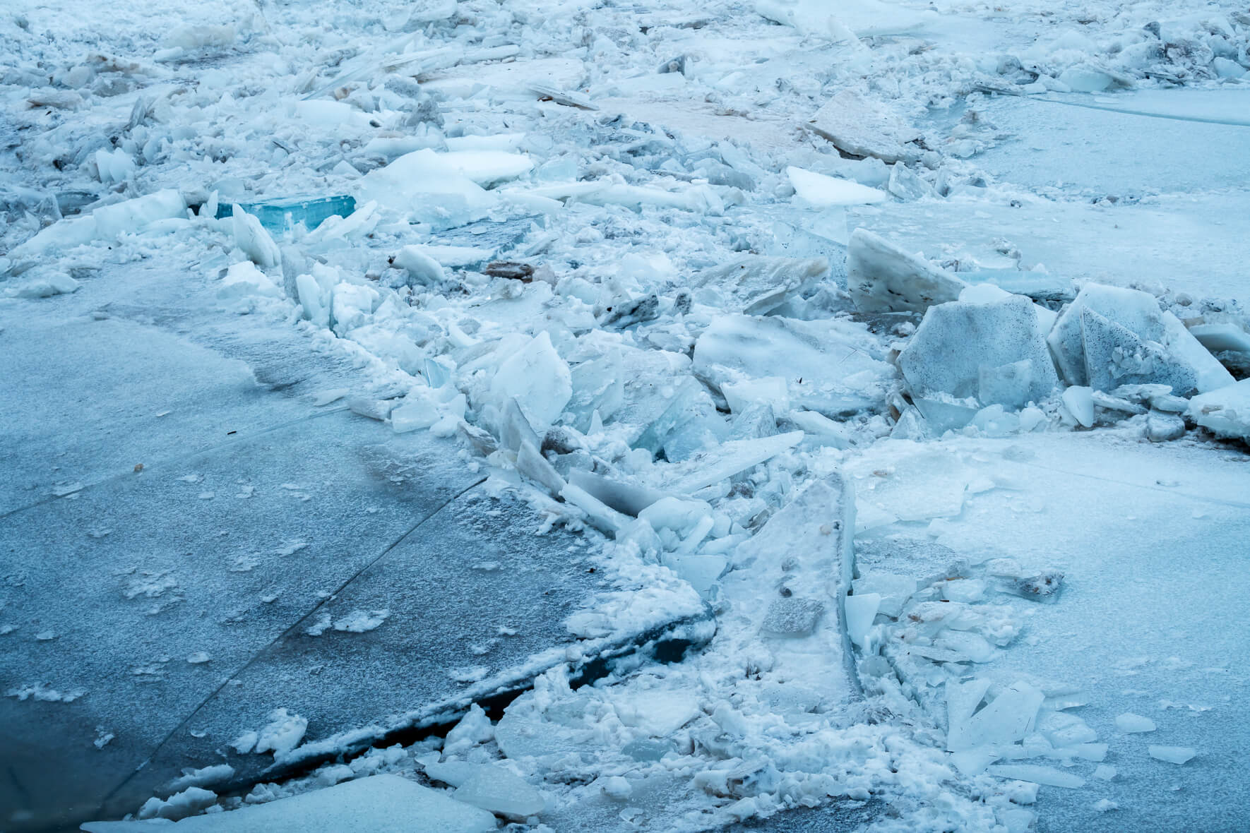Ice floes piled on top of each other on a river on the south coast of Iceland