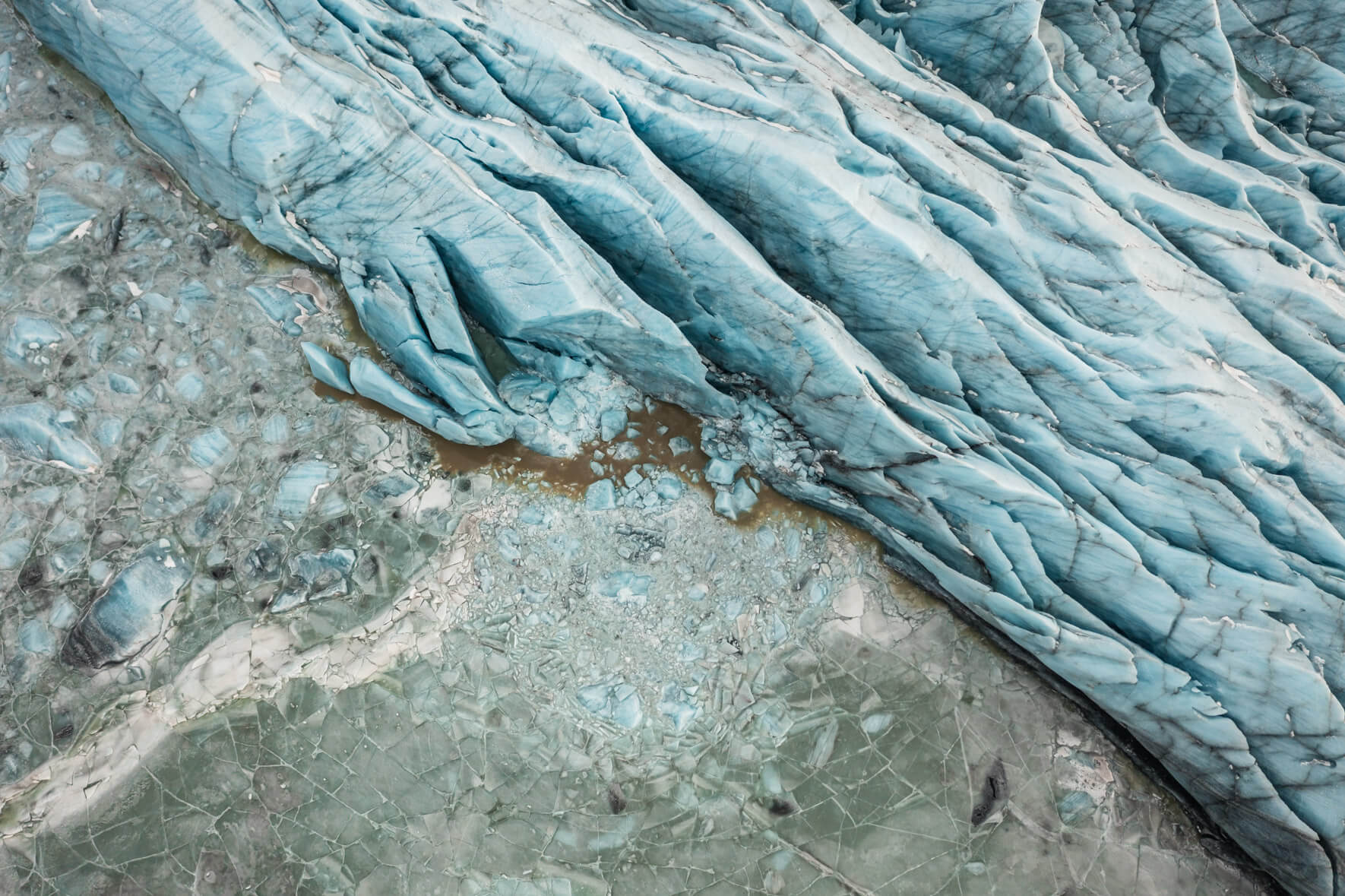 Drone view of Svínafellsjökull glacier feeding into Svínafellslón