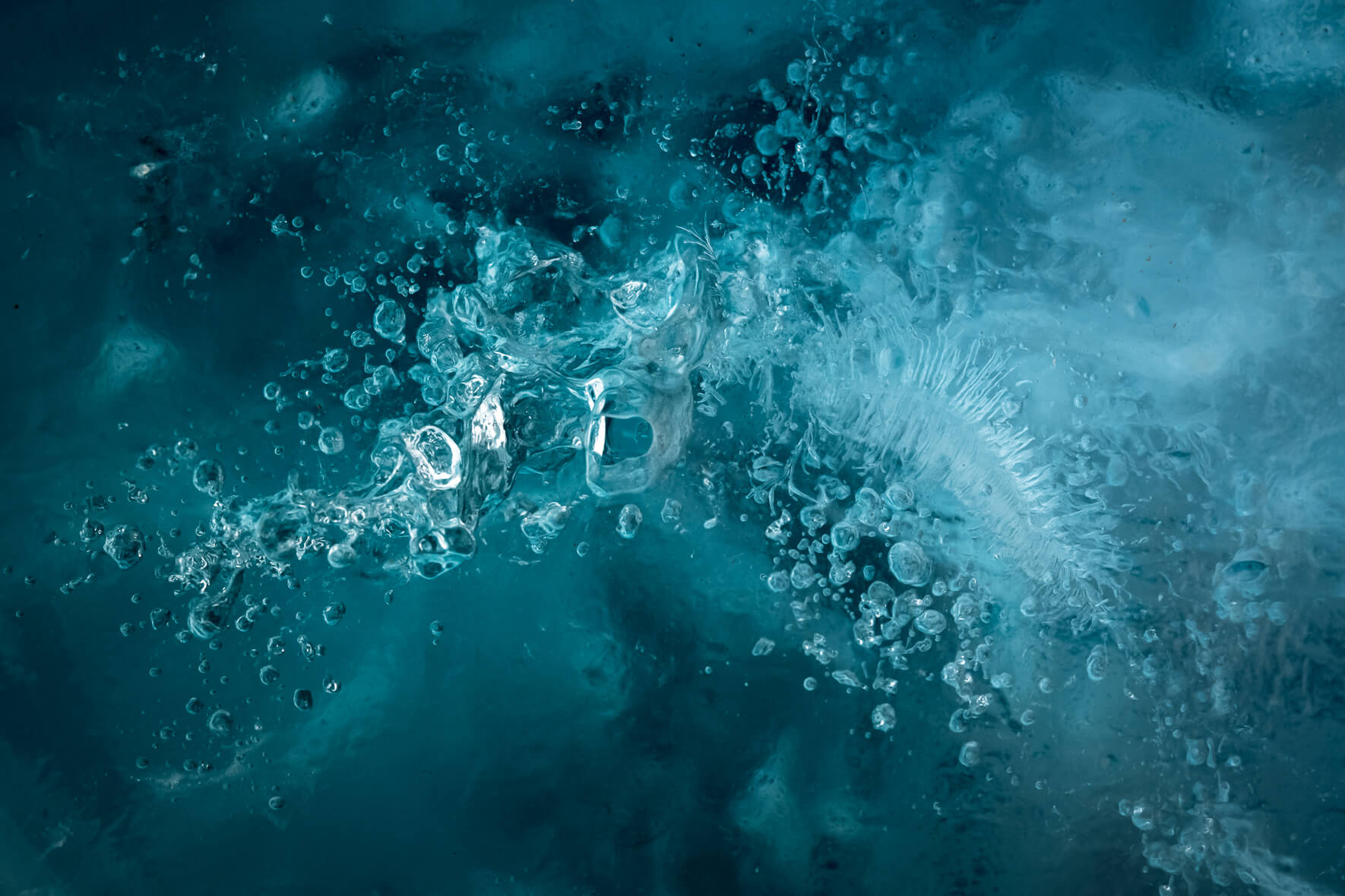 Air bubbles trapped within the glacial ice of Vatnajökull in Iceland