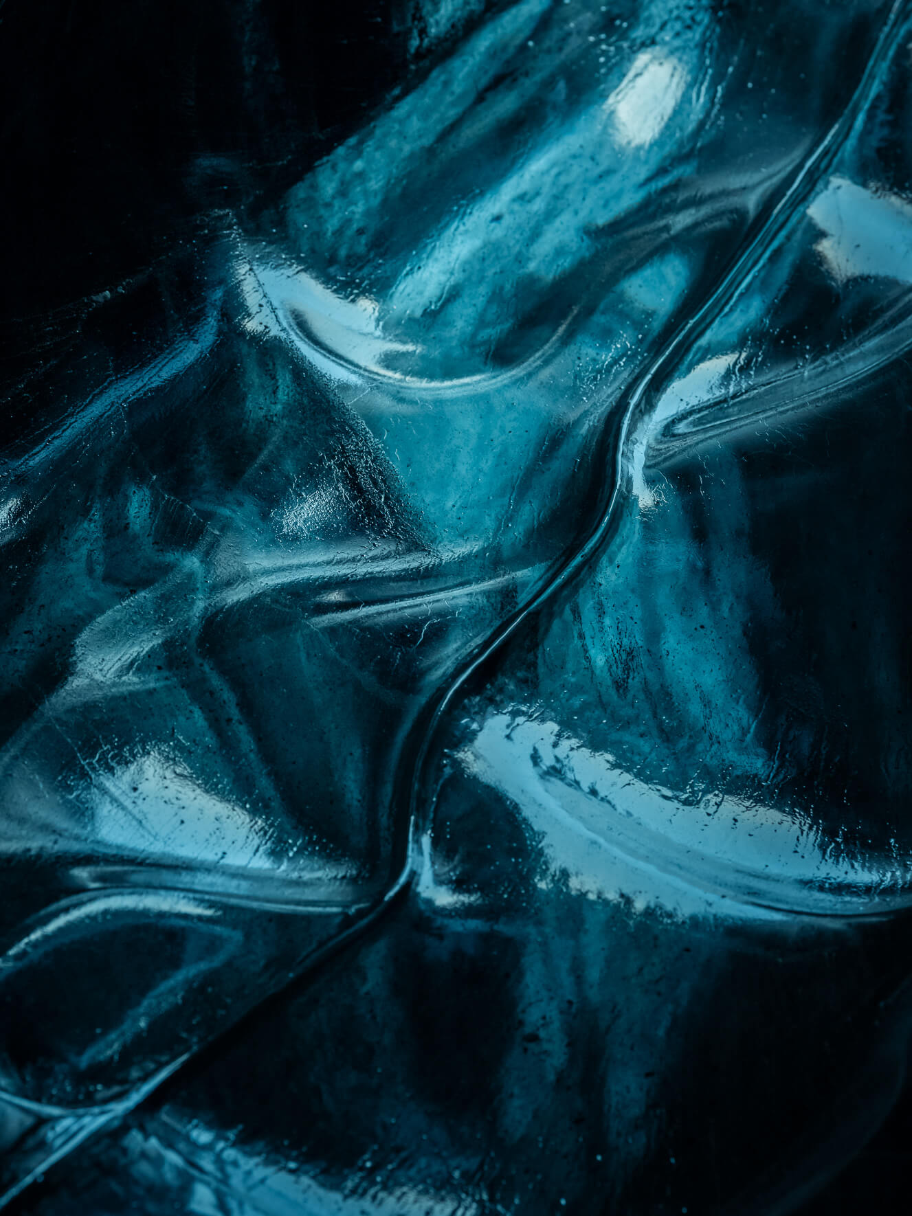 Blue glacial ice of Breiðamerkurjökull in Iceland