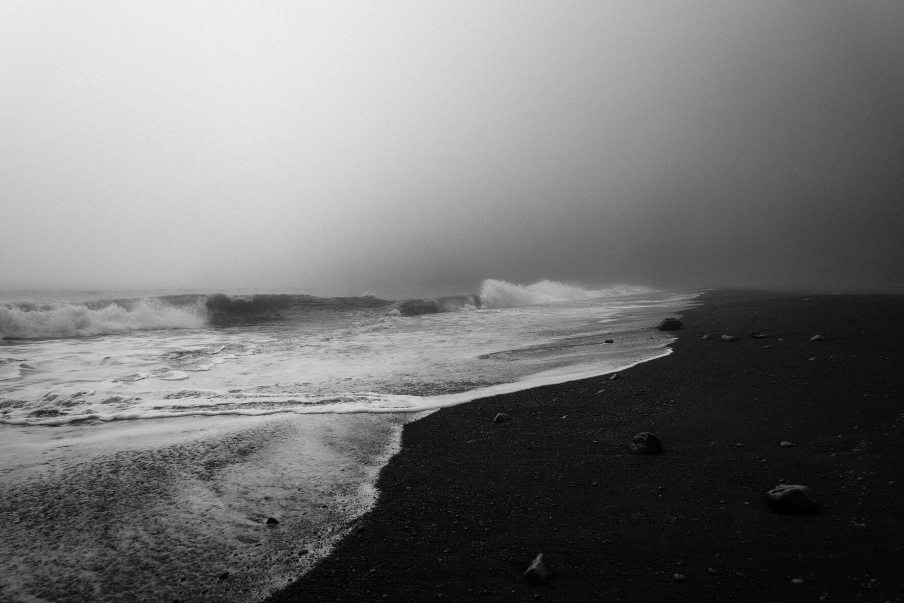 Waves on the black sand beach of Vík í Mýrdal in Iceland