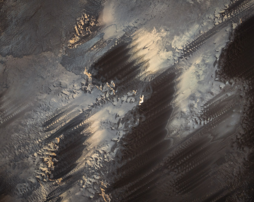 Aerial abstraction of Iceland’s tidal flats constantly reshaped by ocean tides