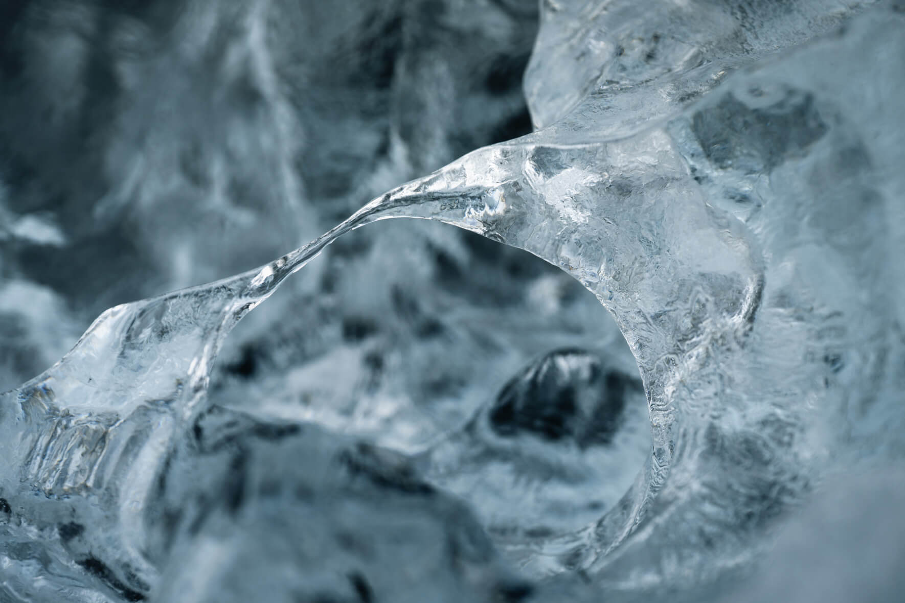 Macro of melting glacial ice revealing fragile forms