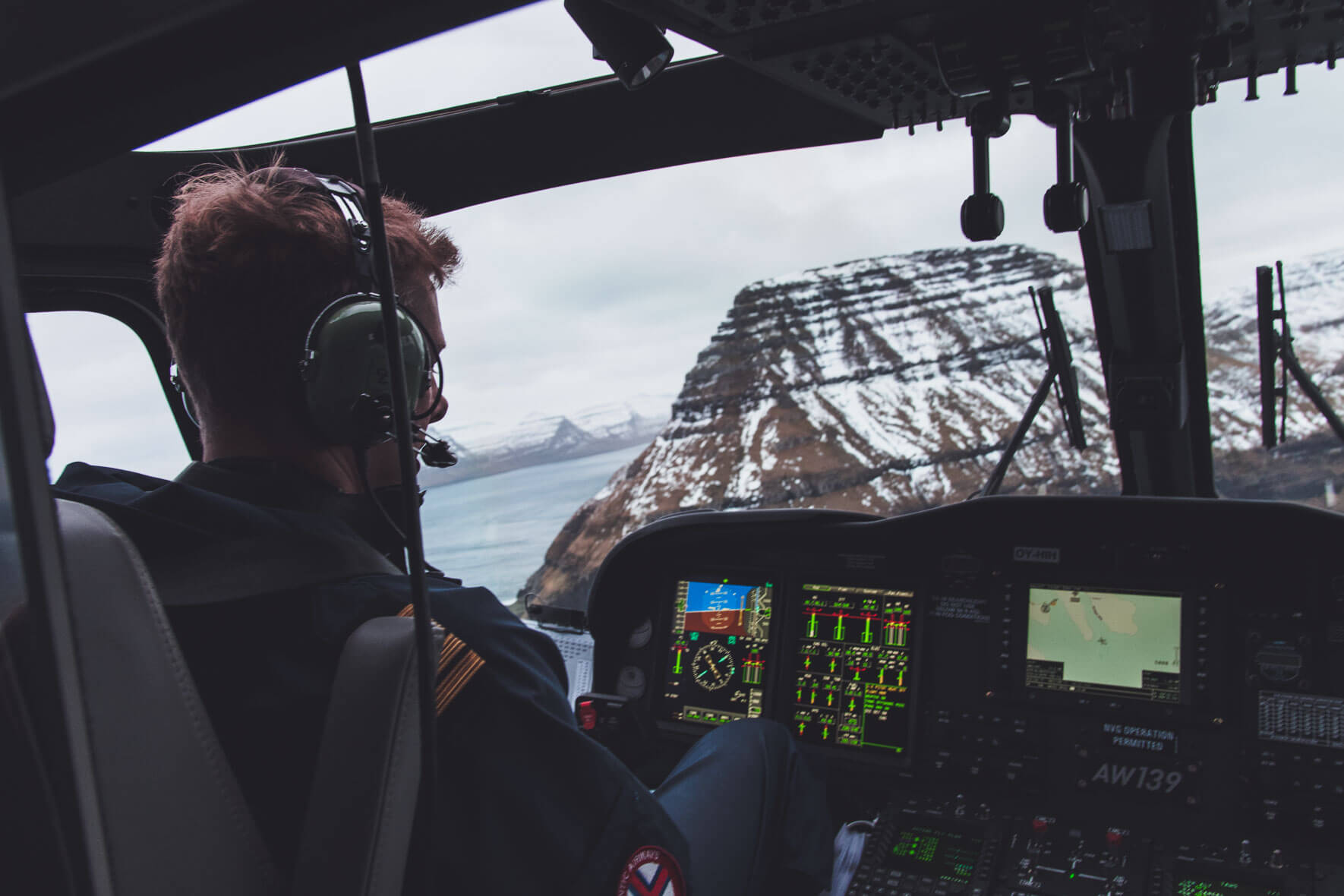 Atlantic Airways helicopter on its way to Klaksvik, Svínoy, and Kyrkja