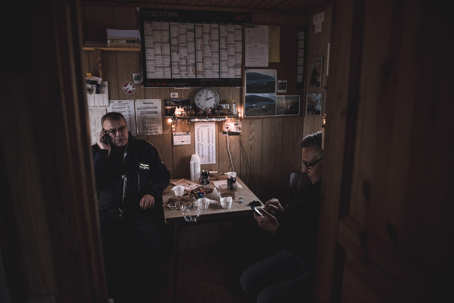 Pilots and passenger at Klaksvik helipad on the Faroes