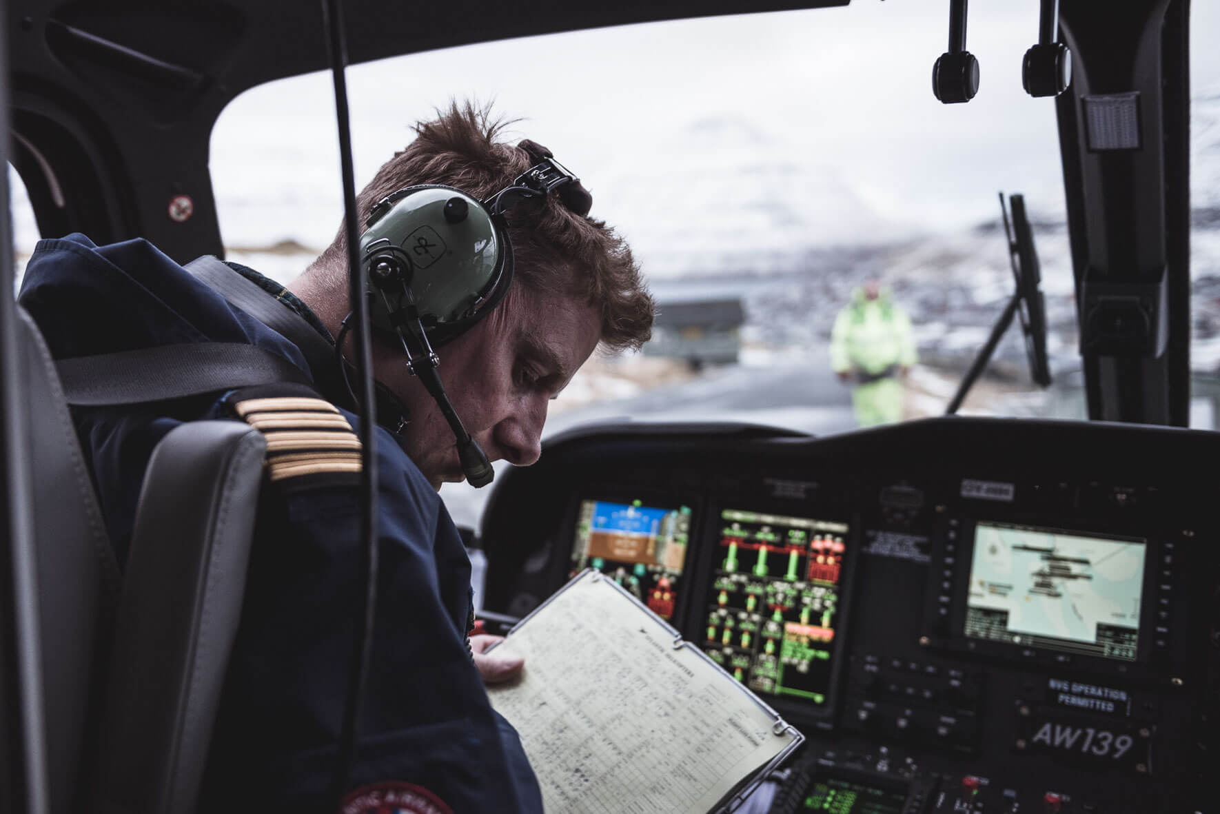 Helicopter pilot at Klaksvik helipad on the Faroe Islands