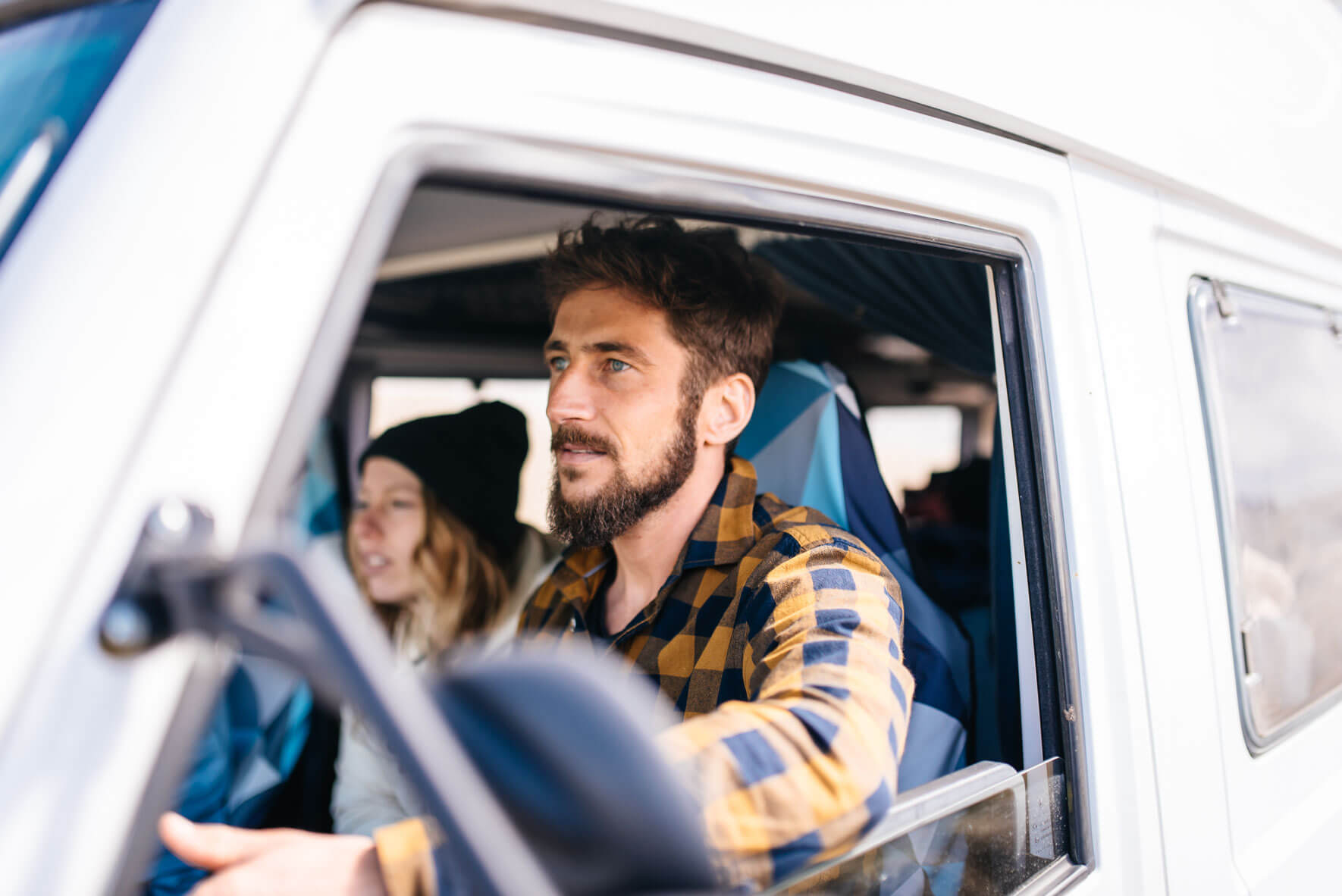 Friends in a Mercedes-Benz MB 100 camper