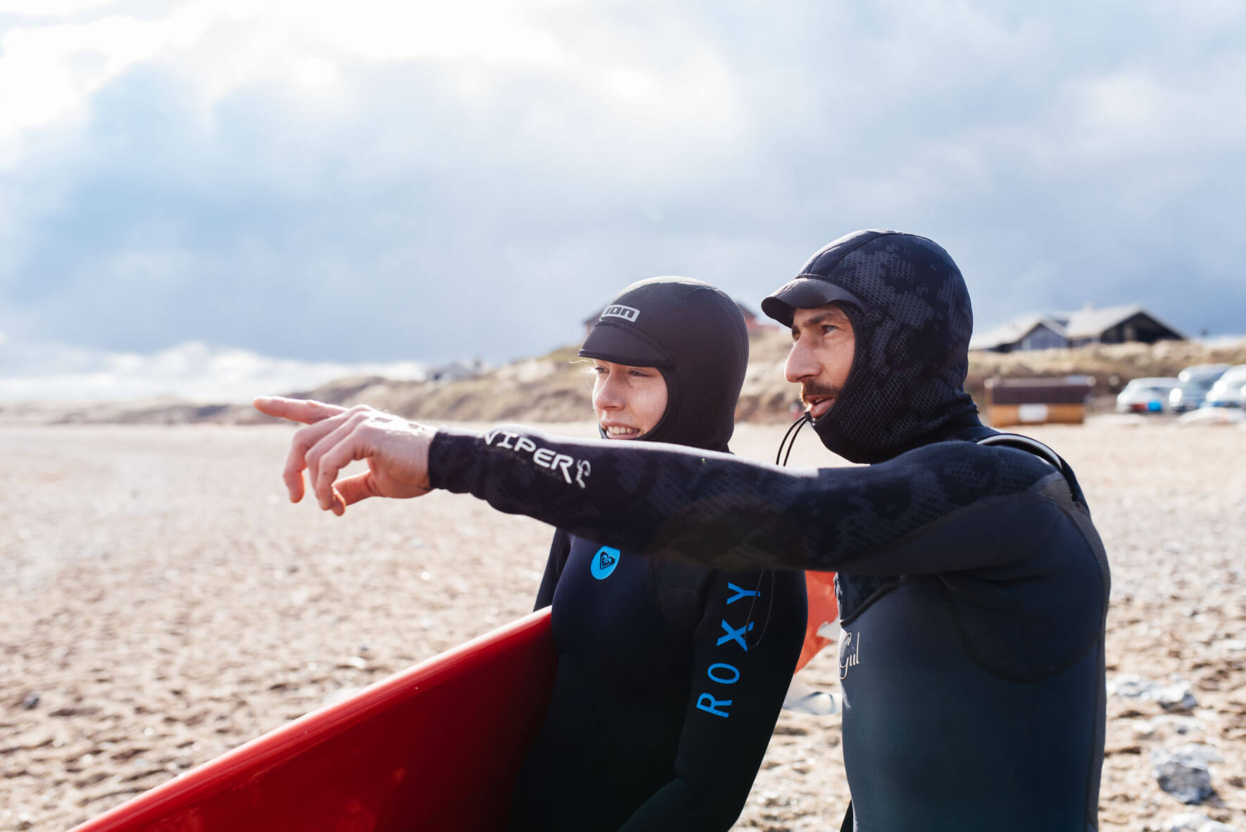 Two surfer on the beach of Klitmøller in Denmark