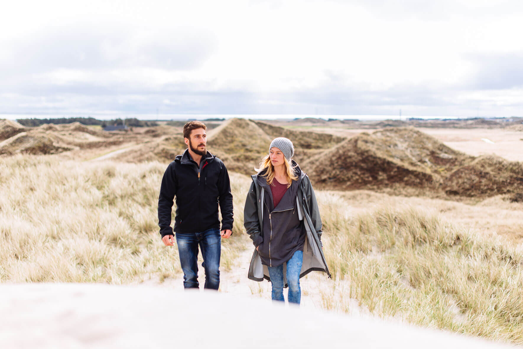 Dune landscape in Denmark with young couple