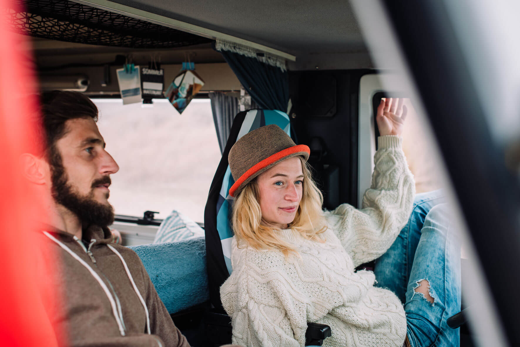 Two friends chilling in camper van