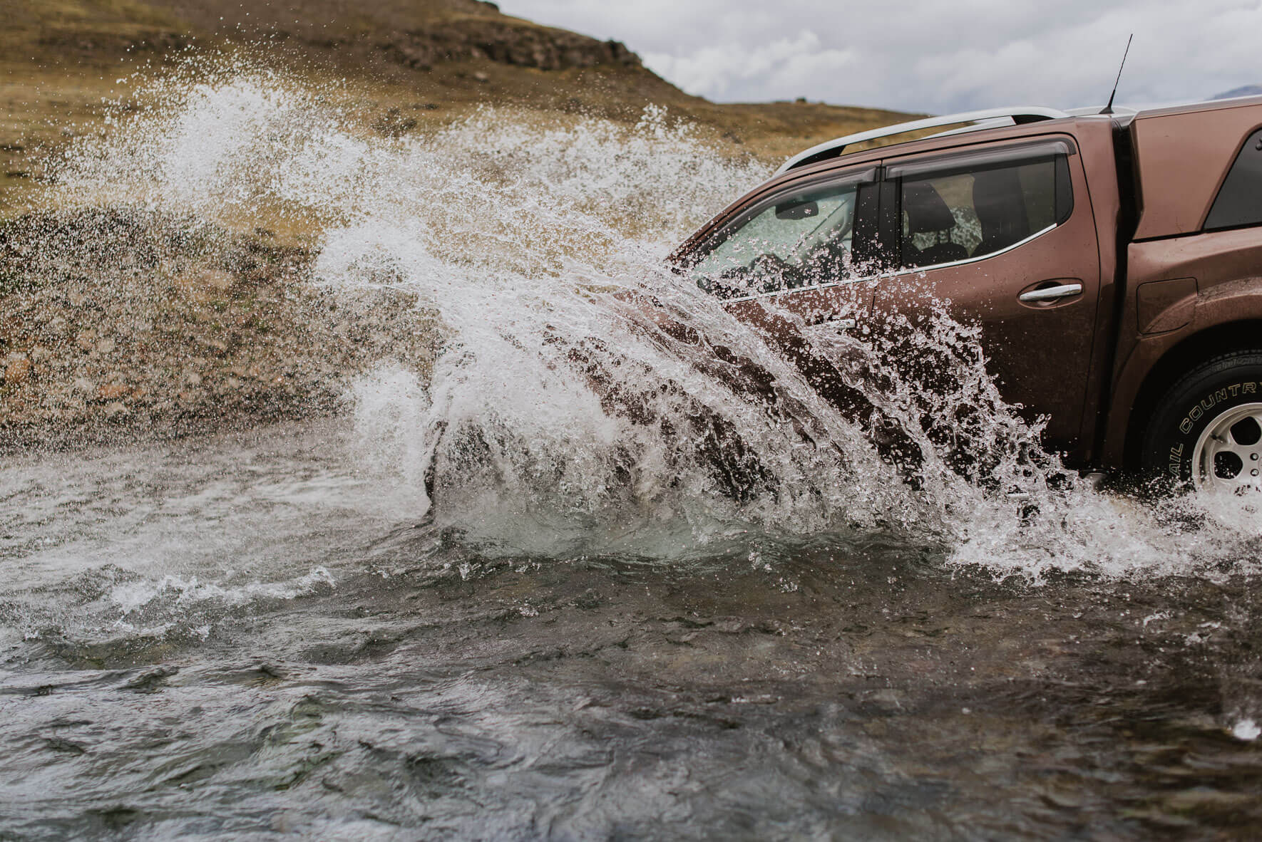 Arctic Trucks Nissan Navara AT35 crossing a river in Iceland