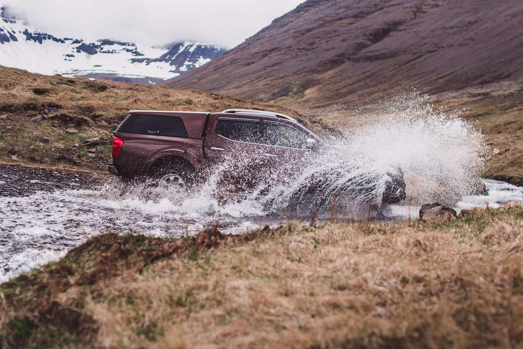 Nissan Navara AT35 (Arctic Trucks) crossing a creek