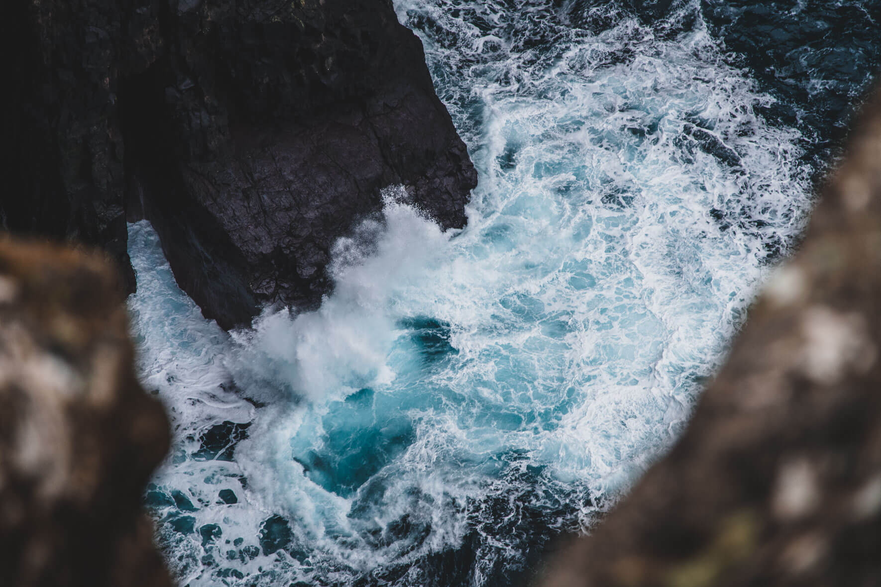 Waves crashing on the cliffs near Sandvík on the Faroe Islands