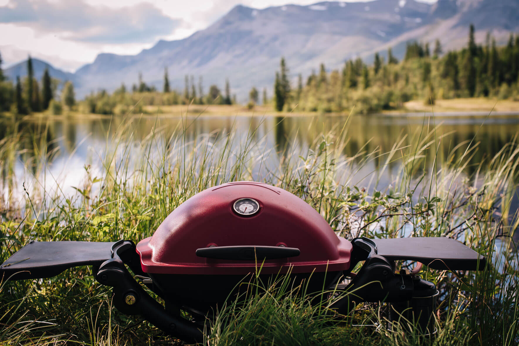 Weber Q 1200 grill in Norway with lake landscape