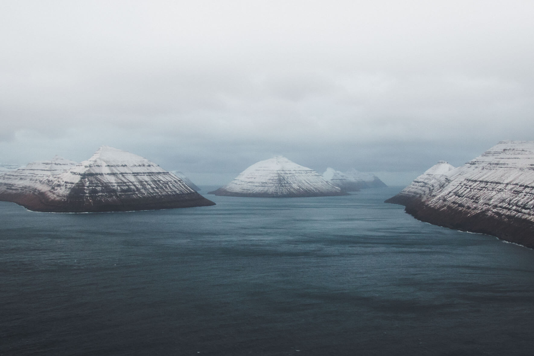 The snowy mountains of the Faroe Islands in Winter