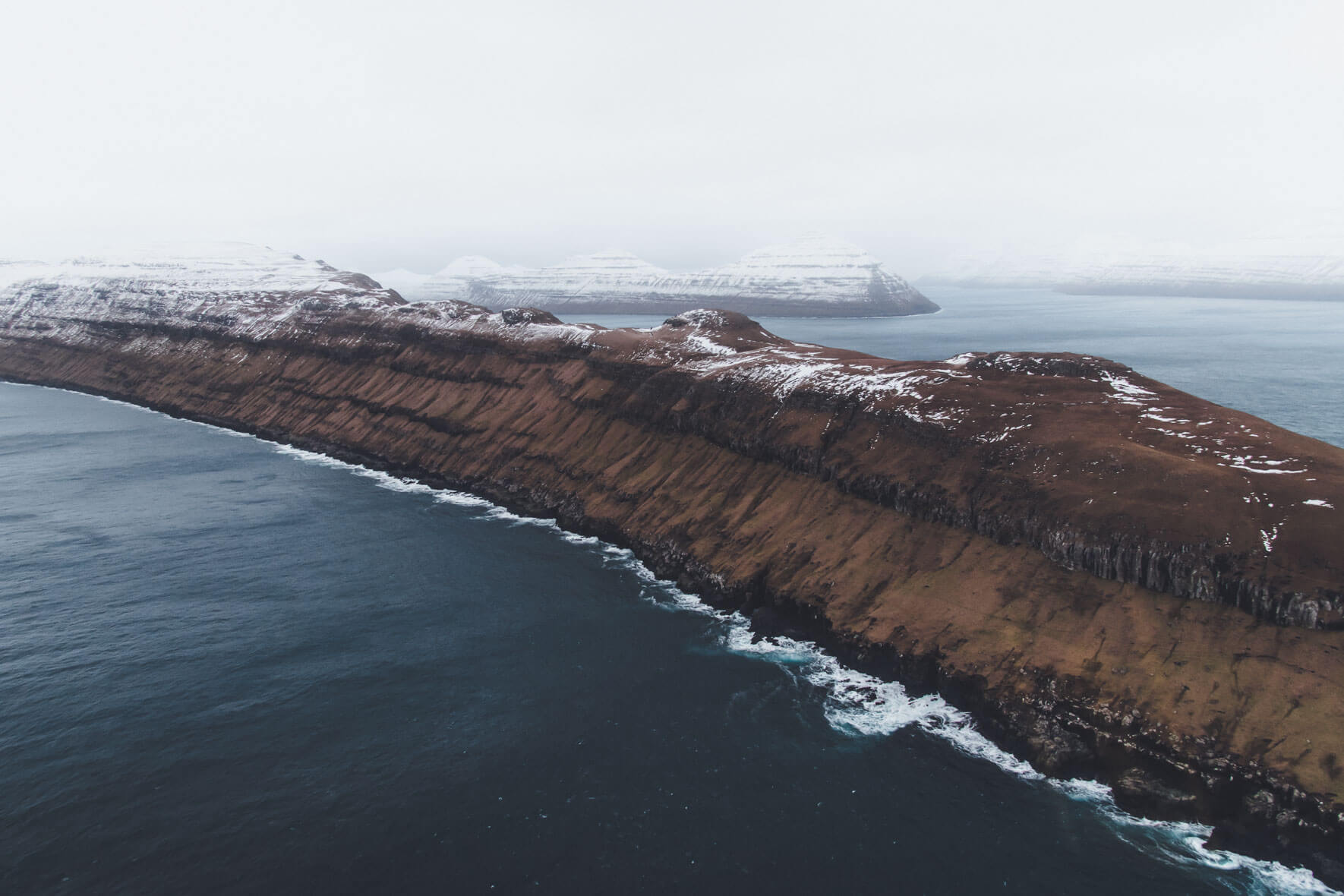 Winter on the Faroe Islands seen from a helicopter