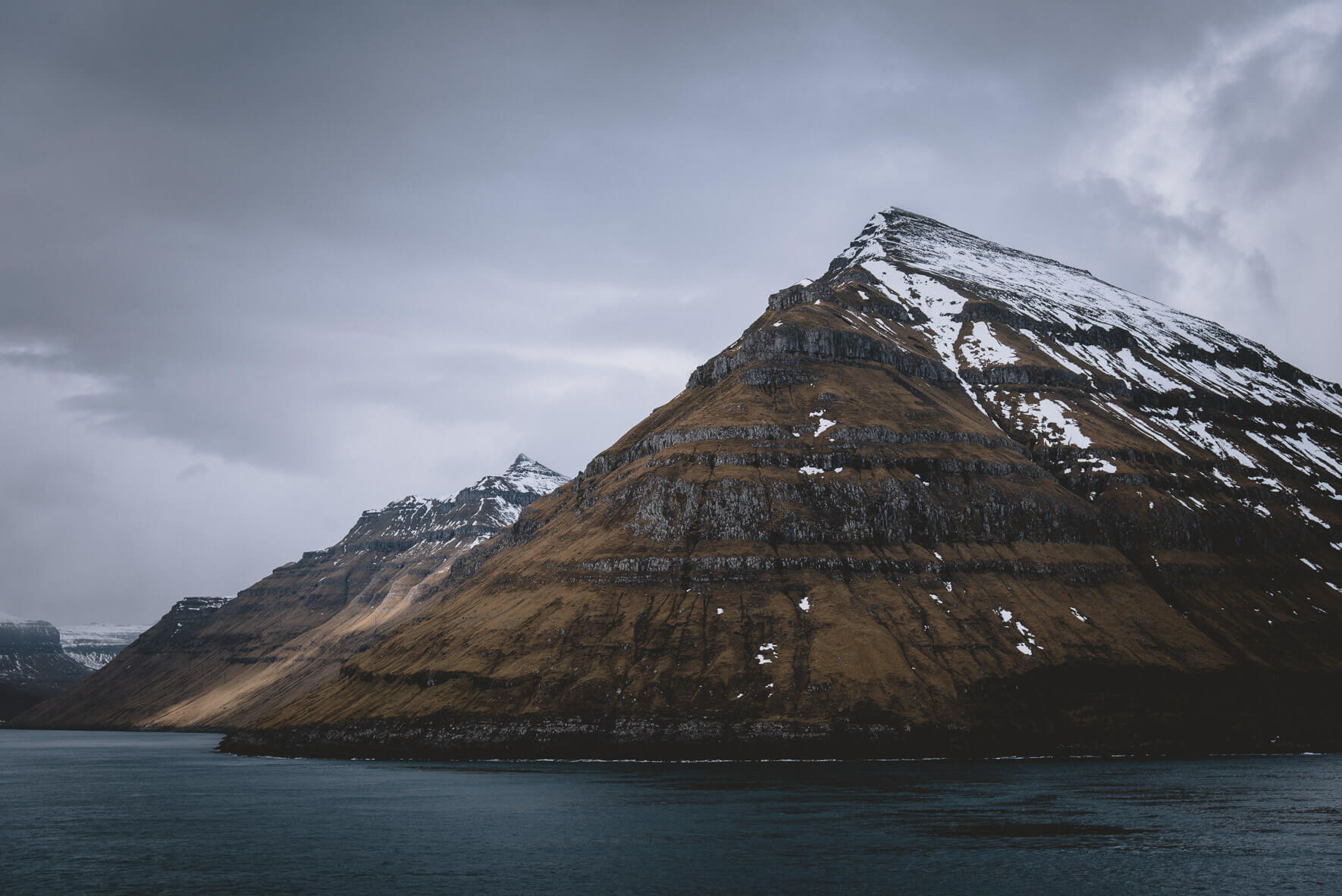 Snowy mountains on the Faroe Islands in October