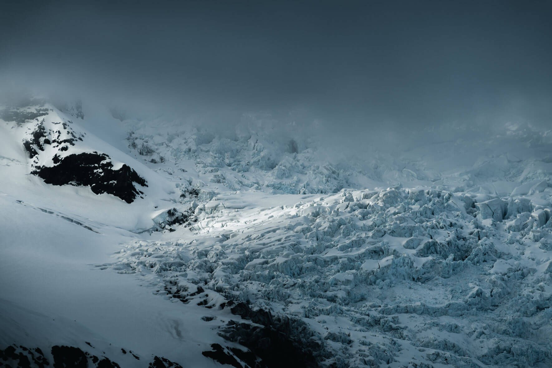 Light shining through clouds on Vatnajökull glacier, Iceland
