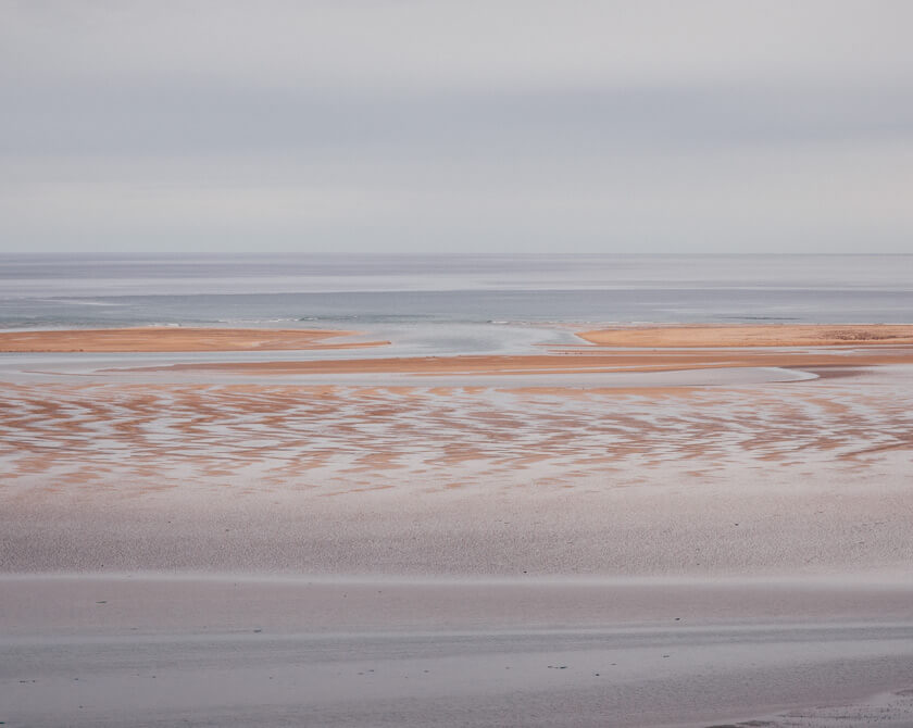 Colorful and abstract tidal patterns in the Westfjords of Iceland