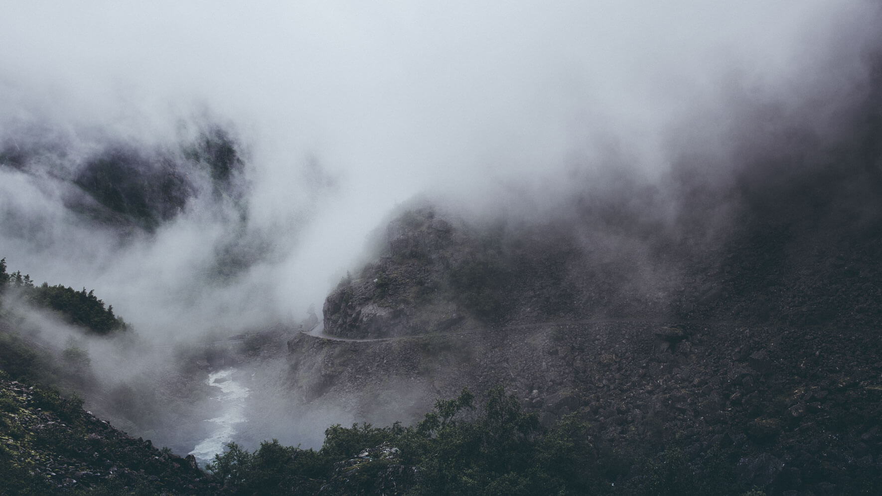 Foggy weather in the Måbødalen valley in the municipality of Eidfjord, Norway