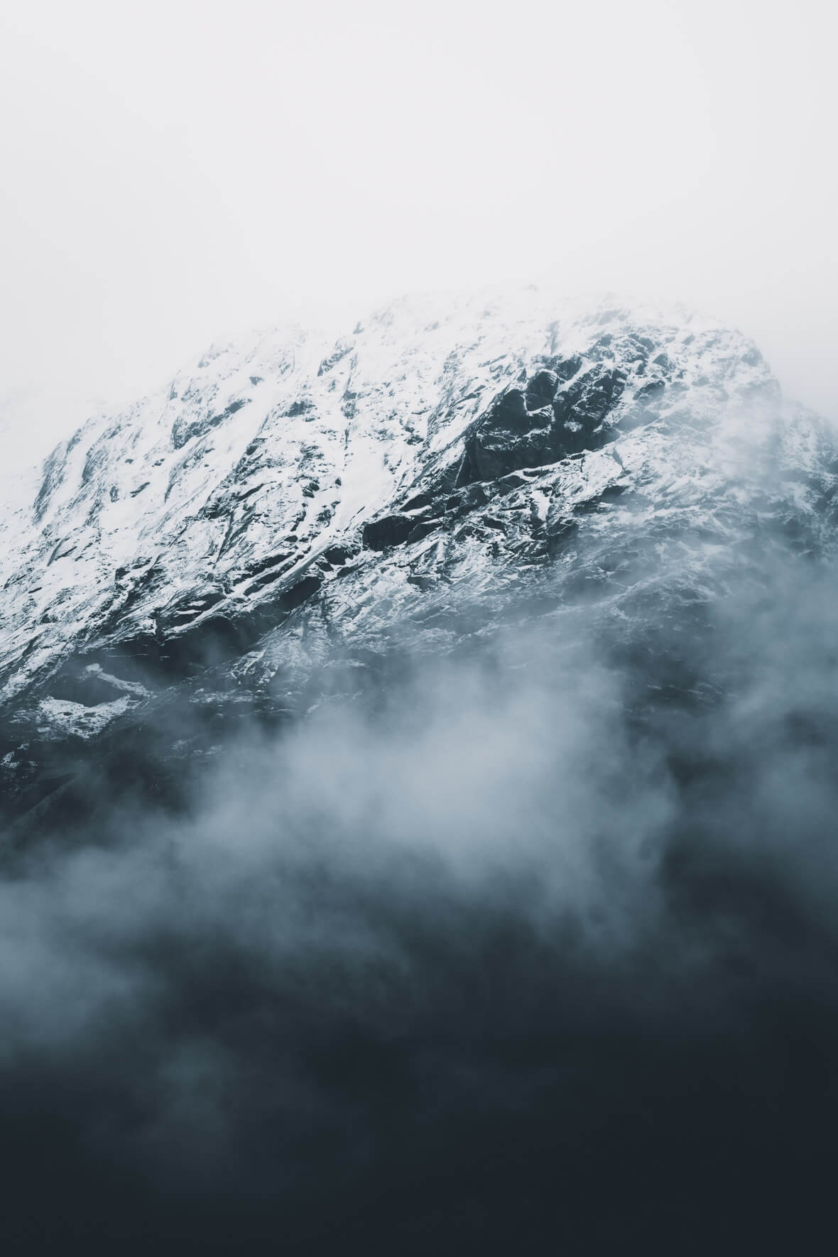 Autumn clouds and snowy mountains of Norway