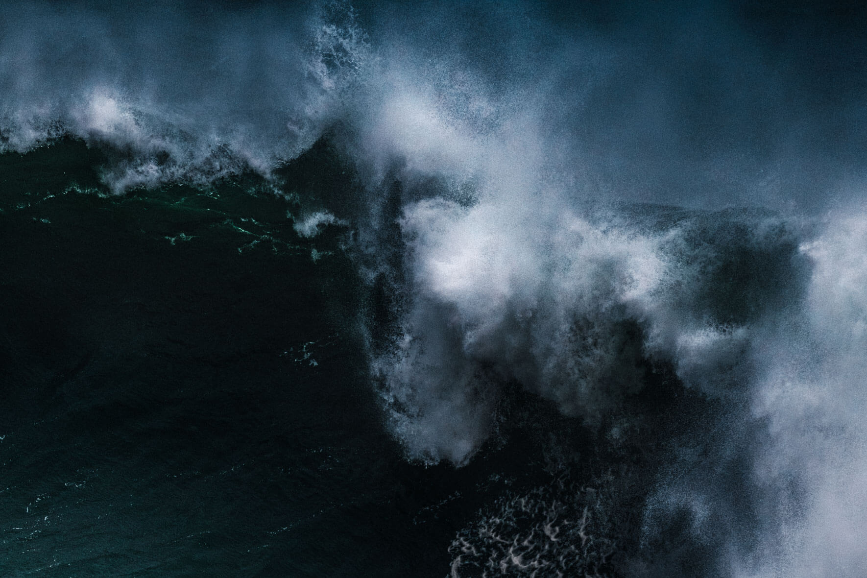 Crashing waves on the Atlantic coast of Nazaré in Portugal