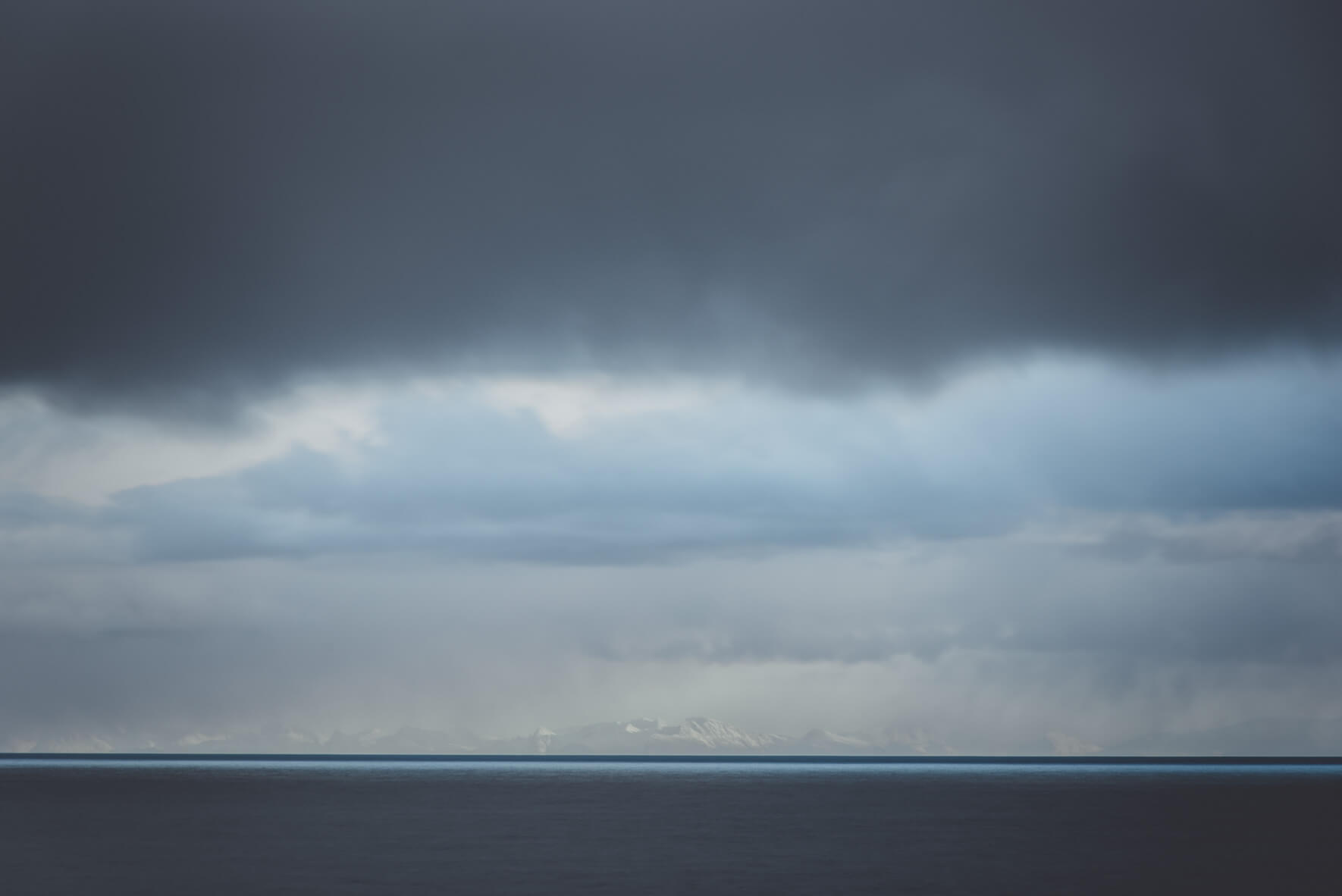 Dark and Blue Clouds over the Ocean