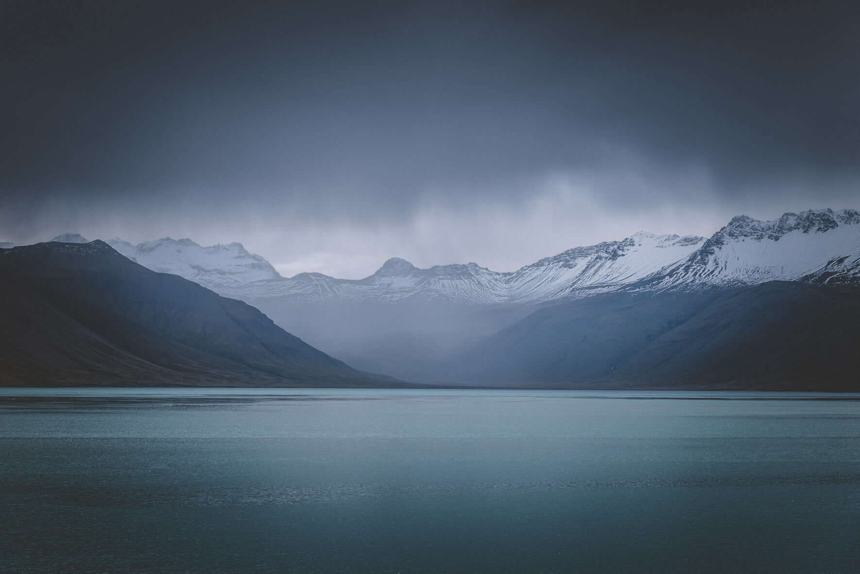 Dark clouds over mountain range in Iceland