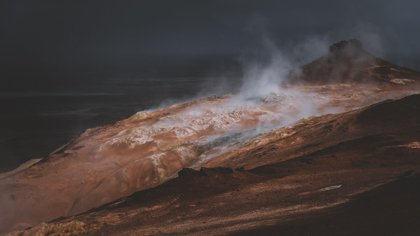 Dark clouds over Mt. Námafjall near lake Myvatn in Iceland